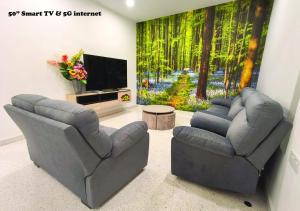 TV a/nebo společenská místnost v ubytování Fair Park 2 at Ipoh Town Center