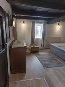 Voodi või voodid majutusasutuse Babamúzeum apartman toas