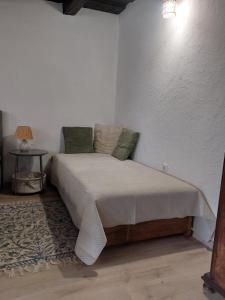 Voodi või voodid majutusasutuse Babamúzeum apartman toas