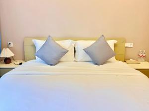 Ein Bett oder Betten in einem Zimmer der Unterkunft 福来小院民宿