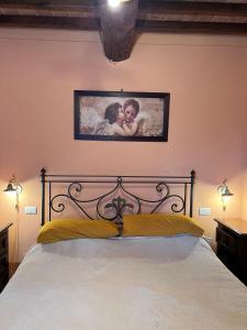 Ένα ή περισσότερα κρεβάτια σε δωμάτιο στο English Garden Cortona +50 φωτογραφίες