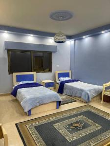 Ένα ή περισσότερα κρεβάτια σε δωμάτιο στο Modern Duplex In the center of Irbid