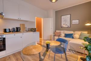 Kuchyň nebo kuchyňský kout v ubytování FullHouse Premium Apartments H11