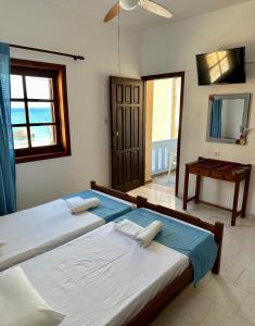 Postel nebo postele na pokoji v ubytování BONATSA Rooms 2
