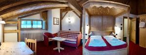 Postel nebo postele na pokoji v ubytování Hotel Garni San Nicolò + 36 fotografií