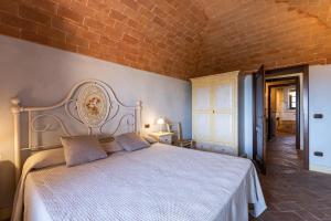 A bed or beds in a room at La Terrazza