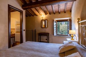 A bed or beds in a room at La Terrazza