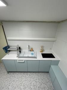 Η κουζίνα ή μικρή κουζίνα στο Stay The Meomuleum Sanbon +18 φωτογραφίες