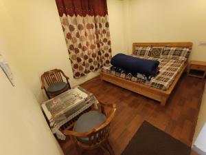 Postel nebo postele na pokoji v ubytování Panorama Home Stay + 8 fotografií