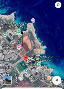 a map of a beach and the ocean at Paradise Sea Terrace in Monopoli