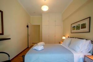 Ένα ή περισσότερα κρεβάτια σε δωμάτιο στο Casa Timos