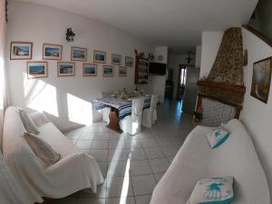 Posezení v ubytování Andrea Frau - Casa Mandorleto new - Sardinia Villasimius-Peaceful Panoramic Terrace-full comfort air conditioning-WiFi-Parking-Privacy