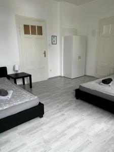 Postel nebo postele na pokoji v ubytování Monteurwohnung Burchard I Rosenau - Platz für 6 Personen