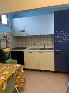 Kuchyň nebo kuchyňský kout v ubytování Fòndaco Scandicci