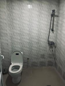 a bathroom with a toilet and a shower at Lenko in Goris +10 photos