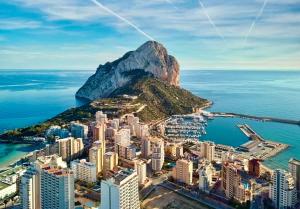 an aerial view of a city with a mountain at Perla del mar 17 in Calpe