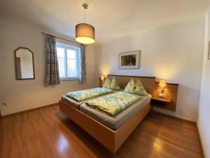Postel nebo postele na pokoji v ubytování Gästehaus Familie Trachsler + 34 fotografií