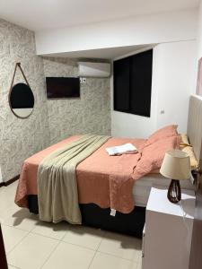 Cama o camas de una habitación en Apt Praia bela,Edificio casa bela,pajucara 77