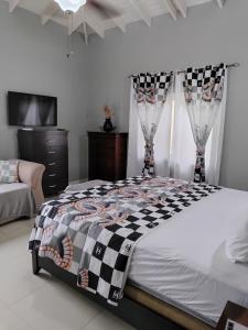 Imagen de la galería de The president room 5 minutes to Devon House 4 Waterloo Avenue Kingston, en Kingston