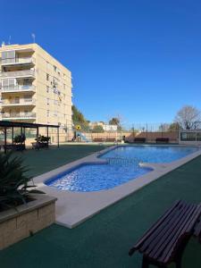 Swimmingpoolen hos eller tæt på Apartamento NARANJA GANDIA GRAU