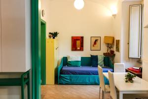 a living room with a couch and a table at Domus Vaticanae in Rome