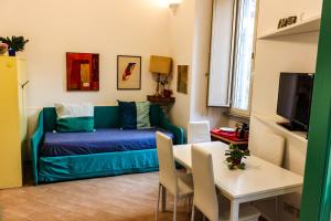 a living room with a couch and a table at Domus Vaticanae in Rome