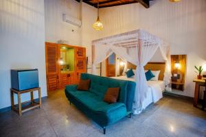 Postel nebo postele na pokoji v ubytování Dillenia Inn-Unawatuna + 32 fotografií