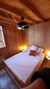Postel nebo postele na pokoji v ubytování Le Nid du Lac