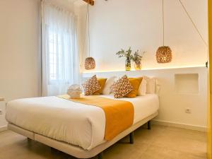 Postel nebo postele na pokoji v ubytování Moona Hostal Altea