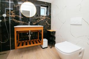 Kúpeľňa v ubytovaní DiDixi Apartments + 15 fotografií