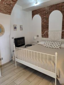 Llit o llits en una habitació de Affittacamere Il Timone