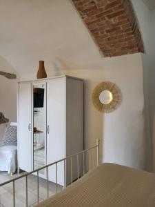 Llit o llits en una habitació de Affittacamere Il Timone