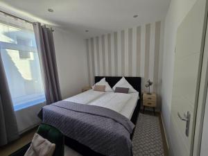 Postel nebo postele na pokoji v ubytování Hotel Kronprinz