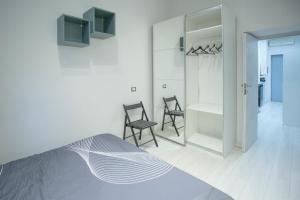 Letto o letti in una camera di Lounge House Vatican - San Pietro