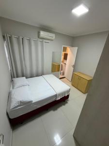 Postel nebo postele na pokoji v ubytování Bella Casa Suites