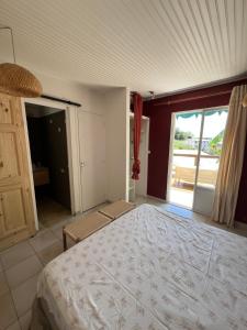 Postel nebo postele na pokoji v ubytování Maison Victoire
