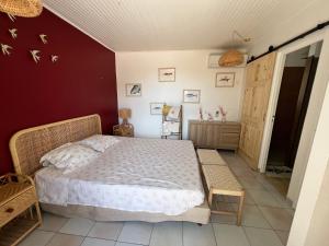 Postel nebo postele na pokoji v ubytování Maison Victoire