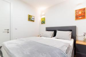 Postel nebo postele na pokoji v ubytování Bogdanović Winery Apartman