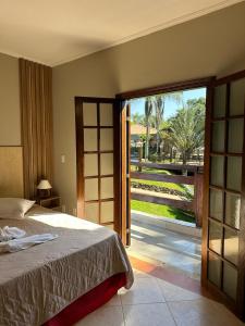 Postel nebo postele na pokoji v ubytování Hotel Fazenda