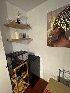 リマにあるCuzco Lodgementの壁面の女性像を用いた部屋 +13枚の写真