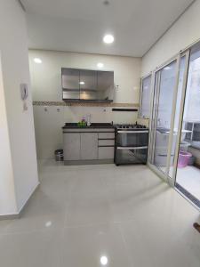 Køkken eller tekøkken på Rio Grande Apartamento + 1 billede