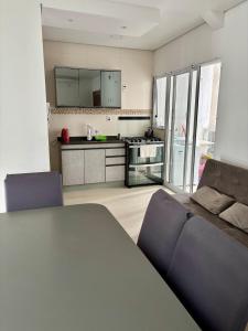 Køkken eller tekøkken på Rio Grande Apartamento