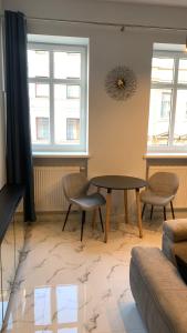 Posedenie v ubytovaní VULTOR Apartments