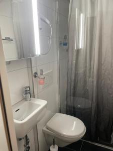 Koupelna v ubytování Lindis Hotel