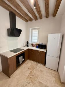 Køkken eller tekøkken på Duplex Art & Détente Centre ville + 7 billeder