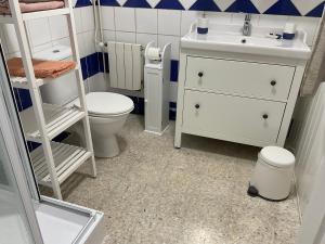 a small bathroom with a sink and a toilet at Villa La PROVENCE in Hyères +85 photos