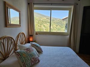 Postel nebo postele na pokoji v ubytování Villa Eolie