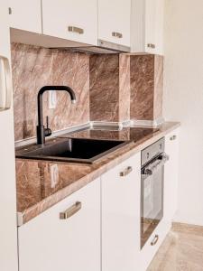 Η κουζίνα ή μικρή κουζίνα στο Apartment Lorena
