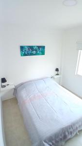 Postel nebo postele na pokoji v ubytování Lo de Pilar