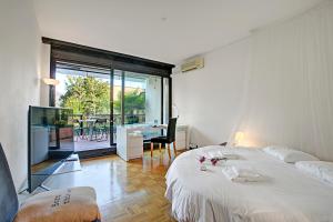 Postel nebo postele na pokoji v ubytování Lugano Luxury - Happy Rentals